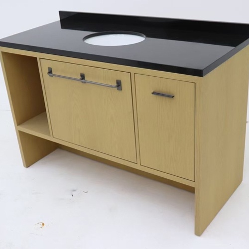 Bathroom wood vanity cabinet with absolute black granite tops and backsplash