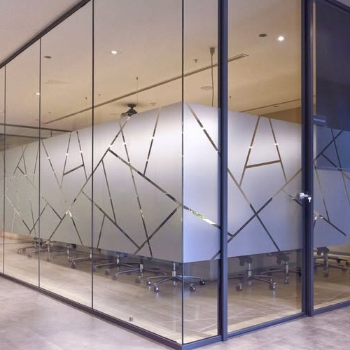 Commercial office partition with etched carving glass