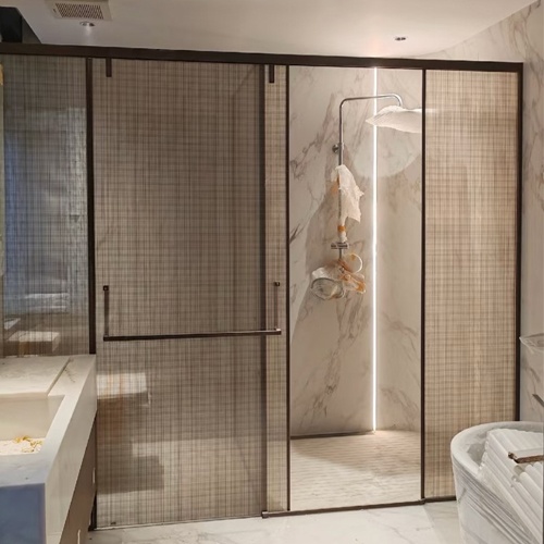 GLASS BATHROOM PARTITION WITH FABRIC LAMINATED GLASS PANEL AND DOOR