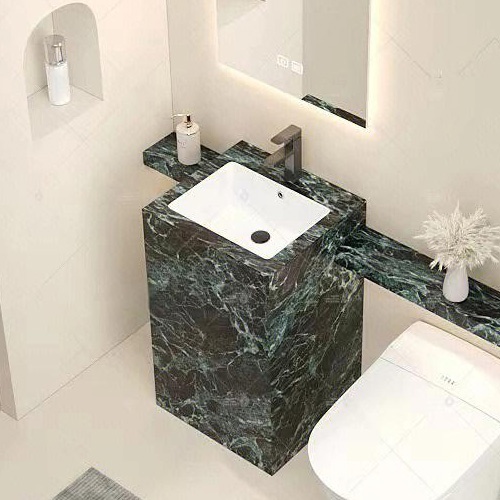 Green marble pedestal bath vanity with ceramic sink