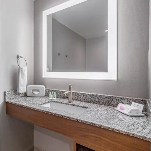 Quality Inn Light Grey Granite Vanity top with Front Plywood Apron