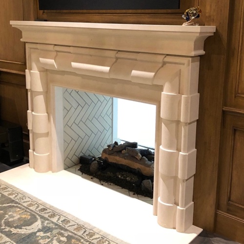 custom limestone fireplace or mantel surround