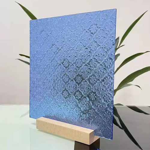 blue tinted and floral textured glass