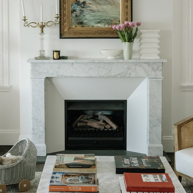 Louis 16th style fireplace in Italian white Carrara Marble