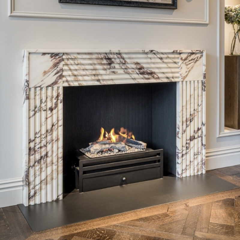 Modern marble fireplace mantel for residential and hospitality space