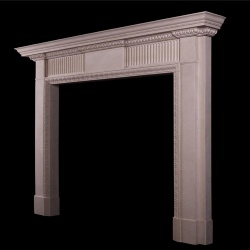 A LIMESTONE FIREPLACE IN THE LATE GEORGIAN MANNER