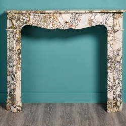 A Louis XV style white marble fireplace Reproduction
