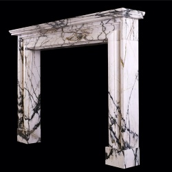 AN ENGLISH MOULDED BOLECTION FIREPLACE IN CALACATTA VERDE MARBLE