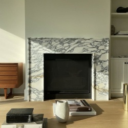 Abrabescato Antico marble fireplace by Grisoro Studio
