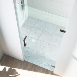 Adjustable frameless hinged shower door left or right side opening