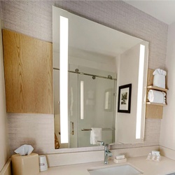 Bath Lit Mirror with Wood Shelf in Hilton Garden Inn