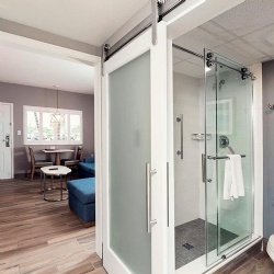 Bathroom Barn Doors for Modern Hospitality and Residential Interiors
