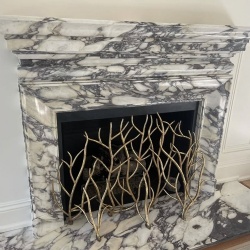 Calacatta Viola marble stunning fireplace mantel