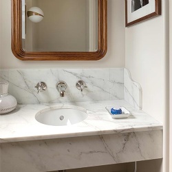 Custom Carrara Marble Vanity for Hospitality Bathrooms