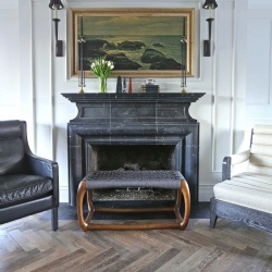Custom marble fireplace in a traditional room