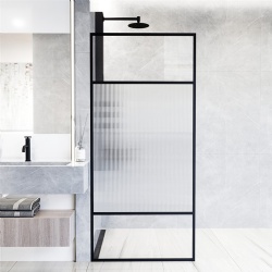 Fixed framed shower screen in matte black with reeded glass