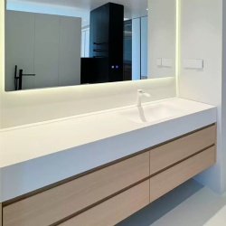 Floating corian bathroom vanity with seamless and integrated sink