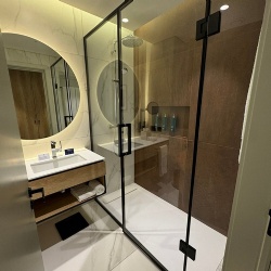 Full stainless steel framed glass partition and swining door for Doubletree by Hilton