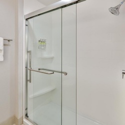 Glass Tub and Shower Enclosure in Holiday Inn Express