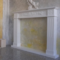 Hand crafted white marble fireplace mantel and hearth