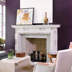 Limestone fireplace mantel with bold quoin accents