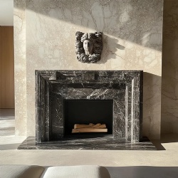 Marble Fireplace Mantel with Ornate Sculpture