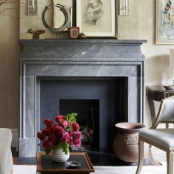 Marble fireplace surround to create a cozy living room