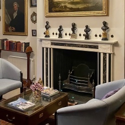 Regency period marble chimneypiece in a library