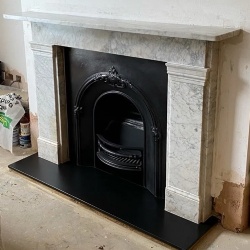 Victorian Carrara marble running frieze flat top surround