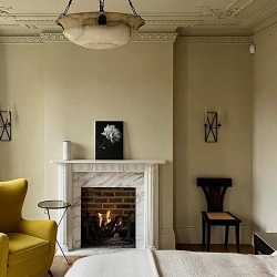 Volakas White marble fireplace mantel for master bedroom of a private residence