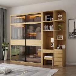Wardrobe millwork with integrated dresser and display shelves