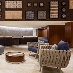 Woven Robe Lounge Chair in Hotel Lobby