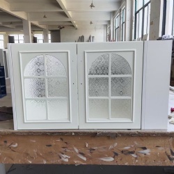 bathroom vanity cabinet door by floral textured glass insert