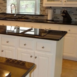 black granite countertops with white cabinets