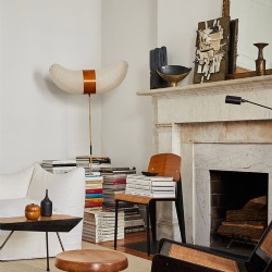 classic fireplace features several different layers and tones of marble