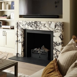 luxury Italian Calacatta Viola marble fireplace surround