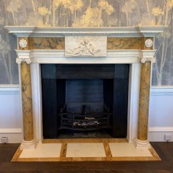 marble chimneypiece at entryhall in Marriott Langley hotel