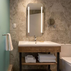matte black metal base vanity with plywood apron