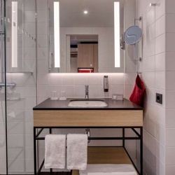 modern bathroom vanity with matte black metal base