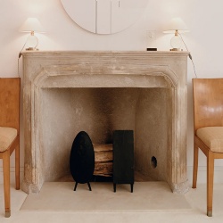stone mantel in the master bedroom