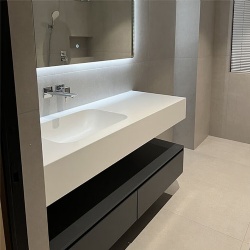 vanity counter and build in wash basin by corian solid surface