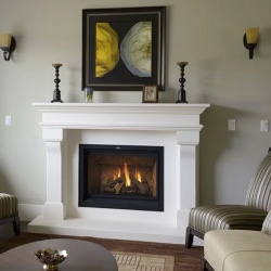 white limestone french design fireplace mantel with a broad mantel shelf